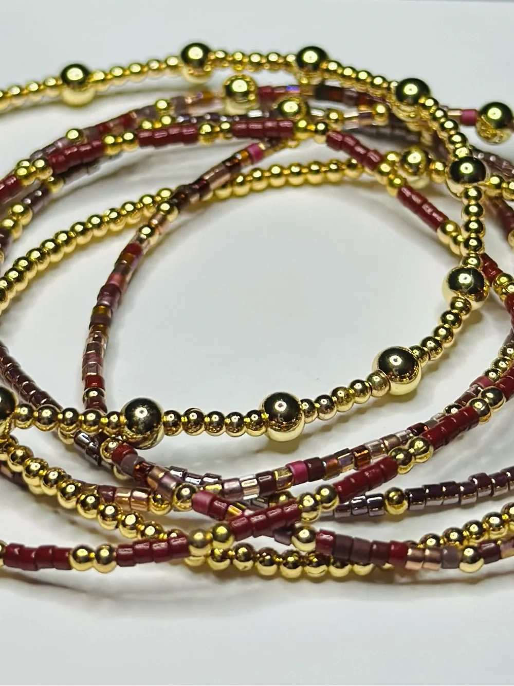 BramFam Beads Burgundy Gold Filled Bracelet Set of 6. Size 6.25”